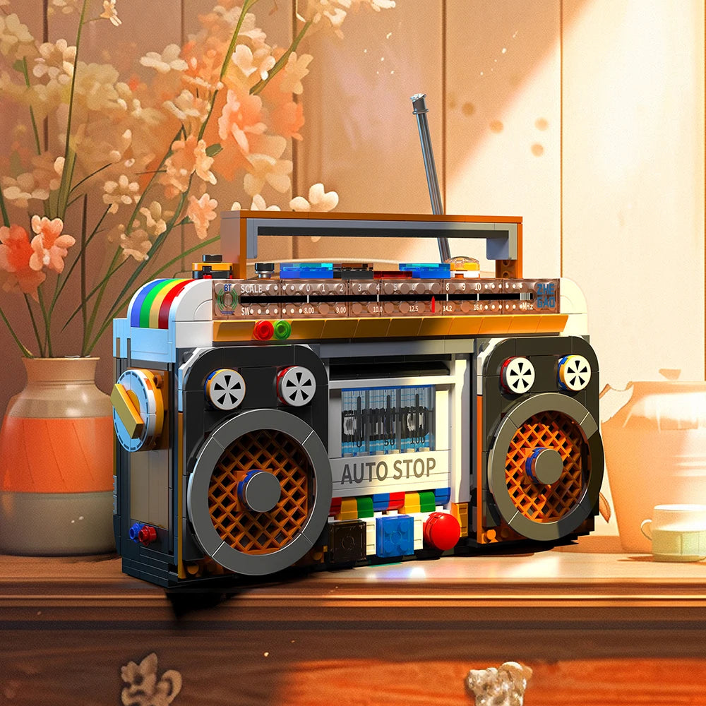 A retro radio building block set featuring a vintage radio design with knobs and speakers on a wooden surface.