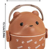 A brown bear-shaped stackable bento lunch box for kids with paw prints and a lid.