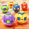 A collection of colorful press-and-rotate stress relief balls in green, yellow, blue, and red.