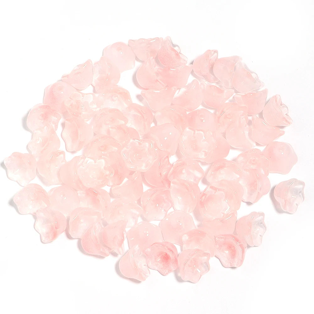A pile of 50 pink cherry blossom flower glass beads for jewelry making