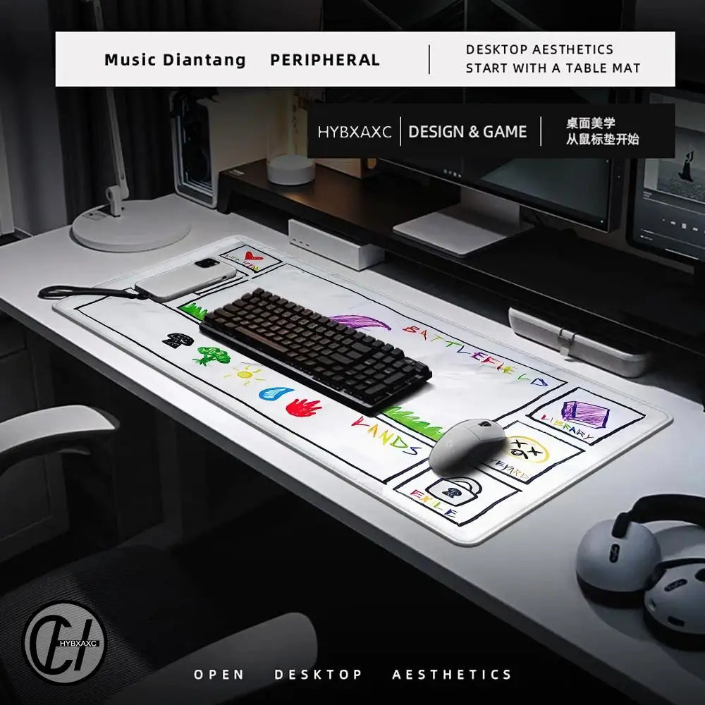 A large gaming mouse pad featuring various icons and stitched edges placed on a desk.