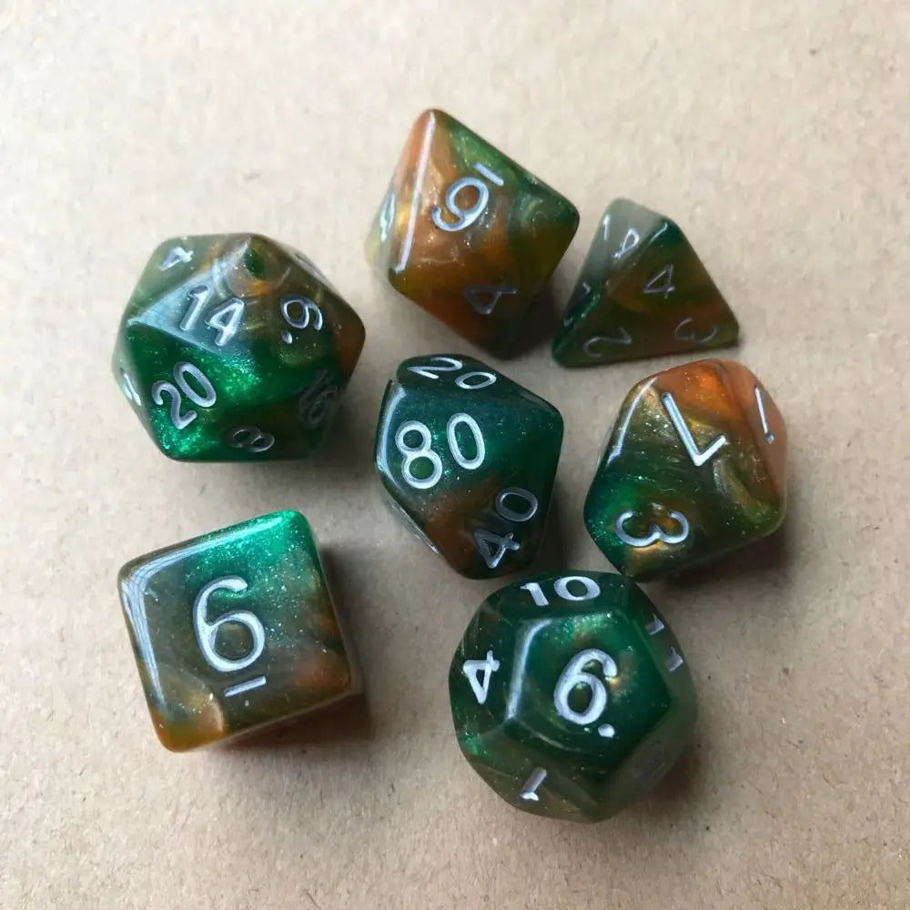 A collection of seven polyhedral acrylic dice showing various numbers and colors on a brown surface.