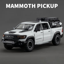 A white Mammoth pickup truck model with black accents and a roof rack is shown in a studio setting.