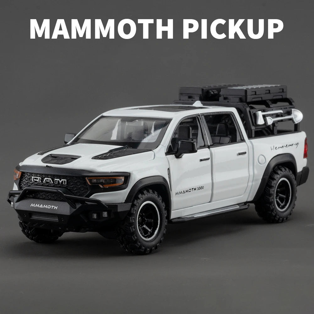 A white Mammoth pickup truck model with black accents and a roof rack is shown in a studio setting.