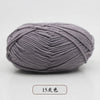 A ball of soft, lavender pre-dyed milk cotton yarn for knitting and crochet.