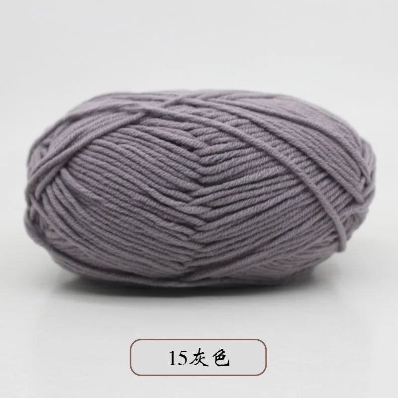 A ball of soft, lavender pre-dyed milk cotton yarn for knitting and crochet.