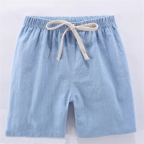 Light blue linen shorts for kids with an adjustable drawstring waist