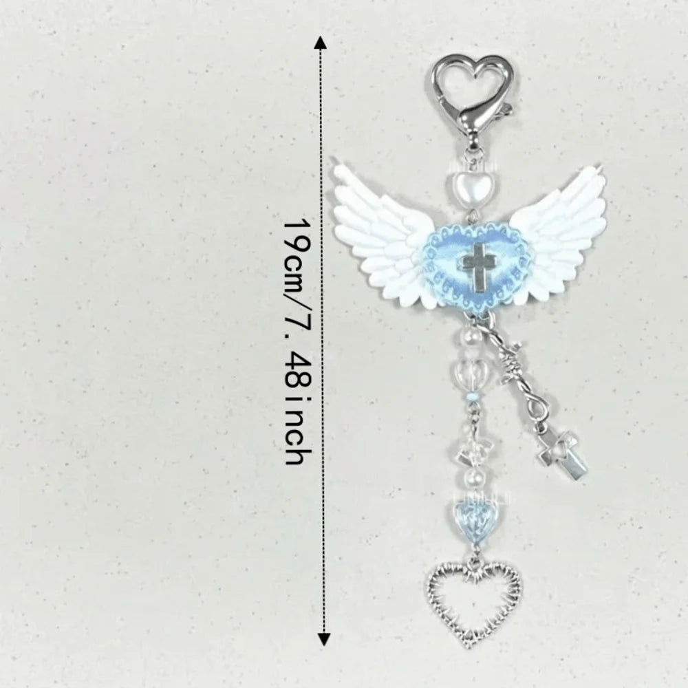 Silver and blue beaded wing cross phone lanyard keychain with a heart charm