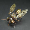 A detailed steampunk mechanical bee model kit featuring brass and bronze metal parts.