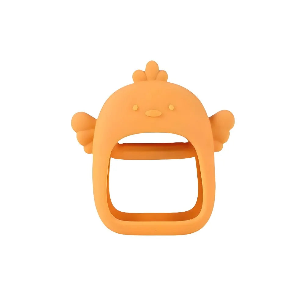 An orange silicone teether shaped like a baby's head with ears and a wide opening.