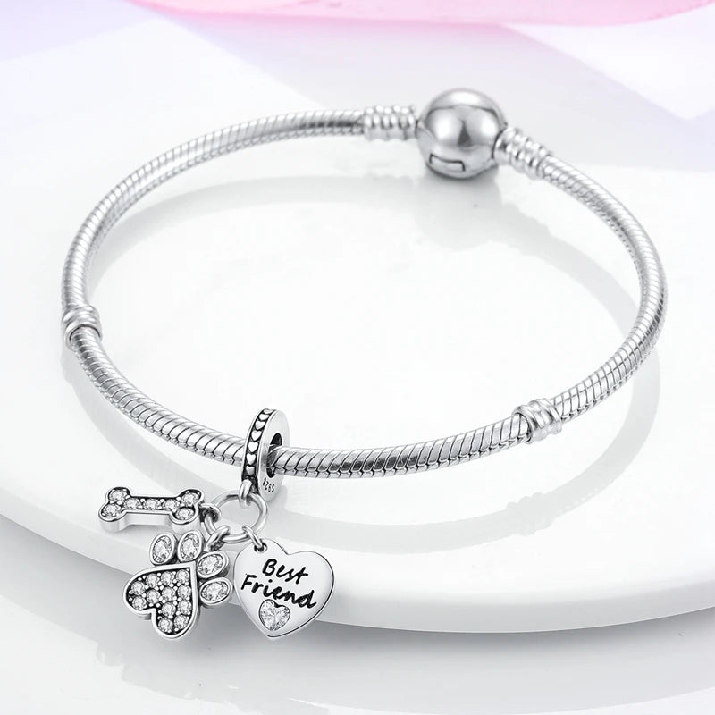 Silver sterling silver bracelet with a charm featuring a heart and the words Best Friend