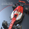 A red and white 1:8 scale racing car model made from building blocks, shown in a dynamic angle.