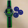 A green and black Ben 10 Omnitrix Projector Watch toy with multiple blue buttons.