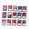 A collection of 12 box art cards for the Magical Athlete Racing Board Game featuring various characters and themes.