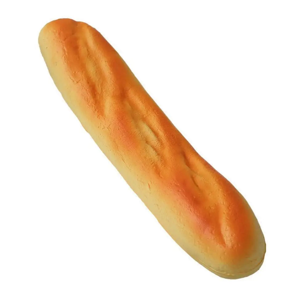 A golden loaf of bread, shaped like a squeeze toy for stress relief and sensory play.