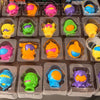 A collection of colorful squishy fidget toys shaped like various monsters and animals.