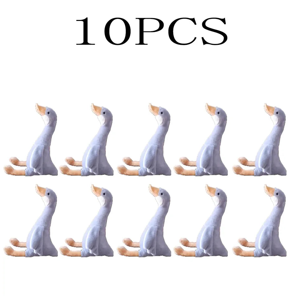 Ten white goose plush toys arranged in a row.
