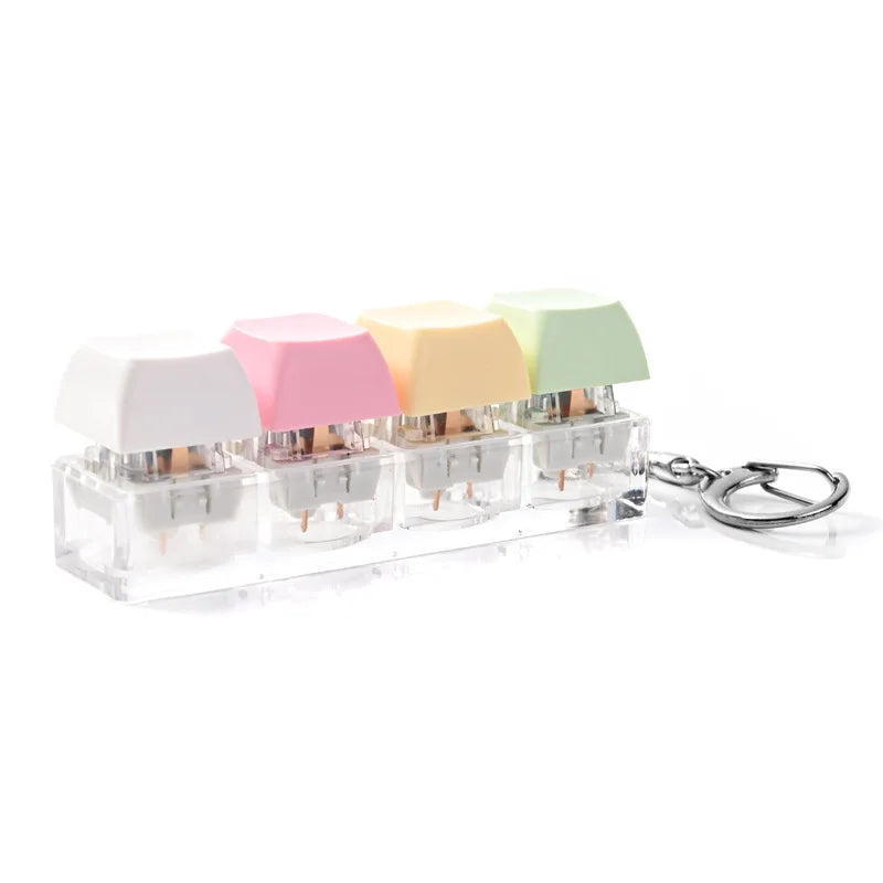 Colorful acrylic keycap fidget keychain with four clicky key buttons in pastel colors