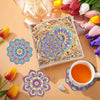 A set of eight diamond painting coasters and a holder are displayed on a light background with colorful floral elements.