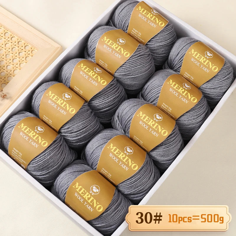 A box of Merino wool yarn in gray, packaged with a label indicating 10 pieces totaling 500 grams.