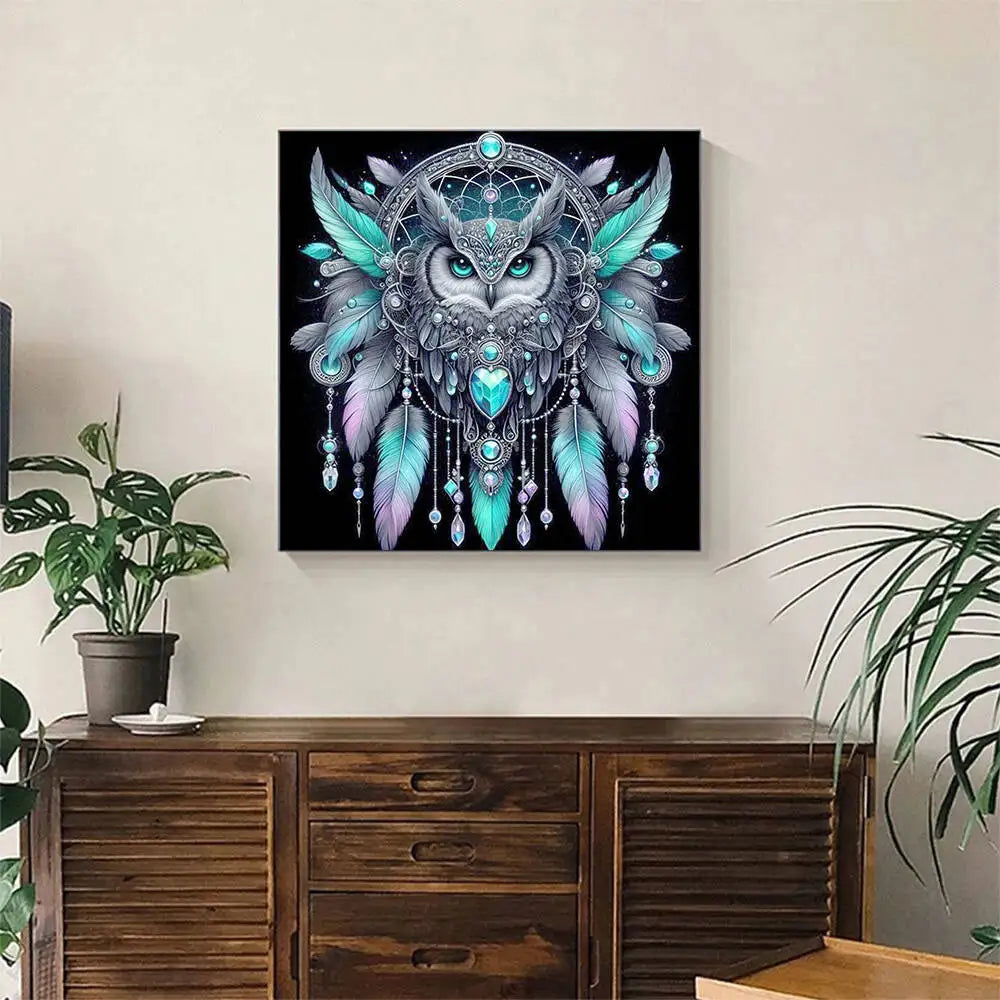A detailed painting of an owl face adorned with iridescent feathers and sparkling blue diamonds.