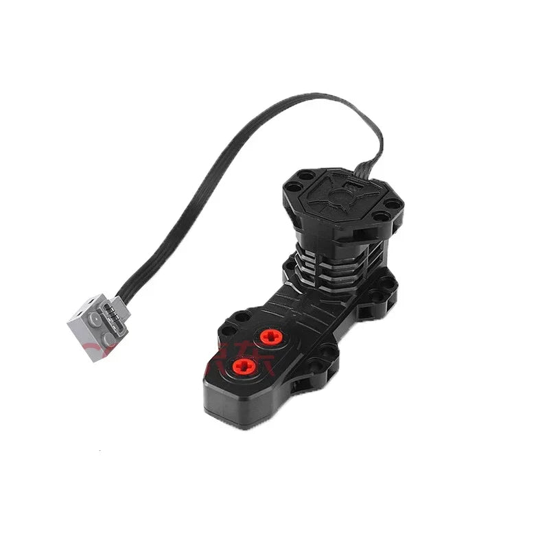 A black motor and servo set with a cable, used for building blocks.
