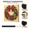 Framed Christmas wreath made of red and green beads and pearls on a canvas board