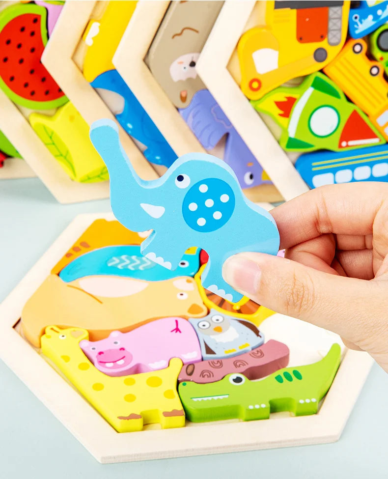 A hand holds a wooden 3D jigsaw puzzle featuring various colorful dinosaur and animal shapes.