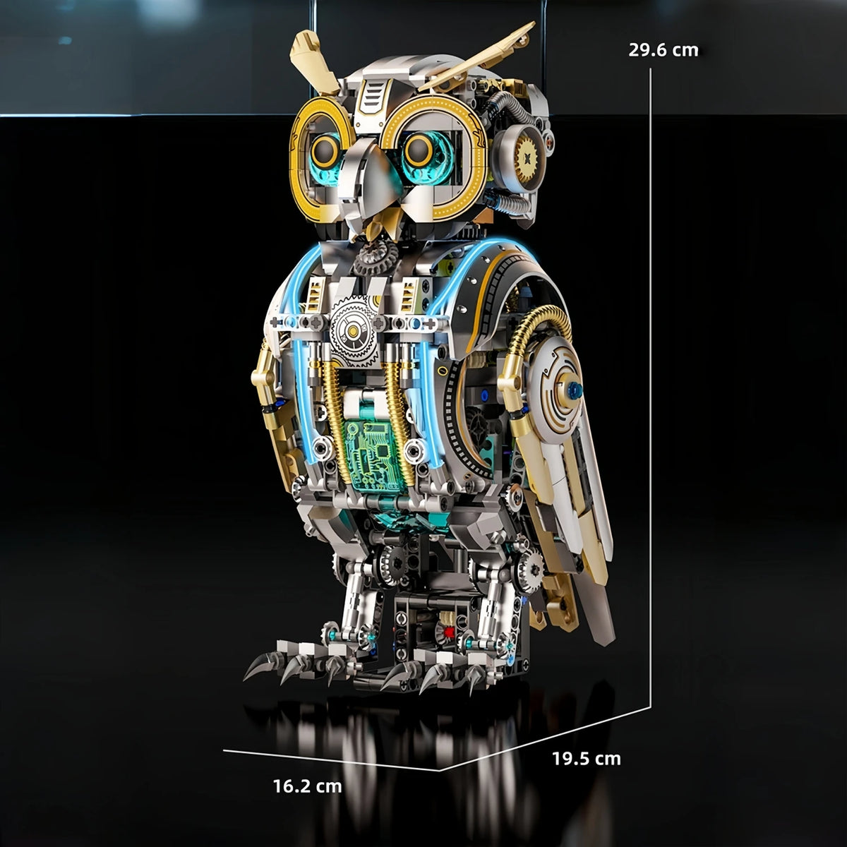A detailed mechanical model kit of an owl, featuring silver and gold components with glowing blue accents.