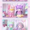 A collection of QUBII Autumn Animal figures in various colors and poses displayed on a shelf.