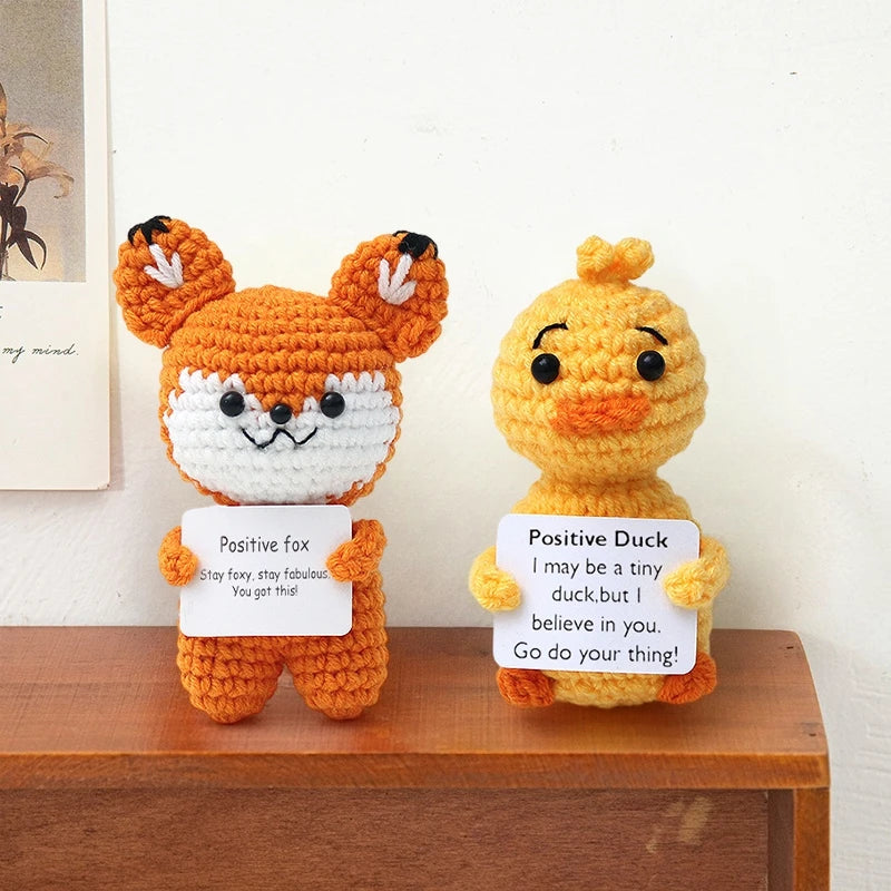 Handmade crochet fox and duck pocket hug dolls with positive inspirational slogans