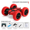 A red 4WD stunt car with large tires and various spare parts listed below it.