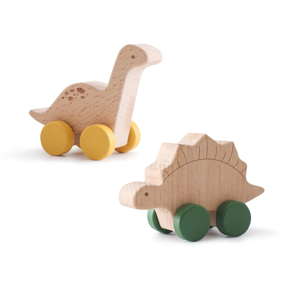 A wooden dinosaur toy car with yellow wheels and green accents.