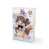 A colorful blind box collectible doll featuring an anime-style character in a packaged box.