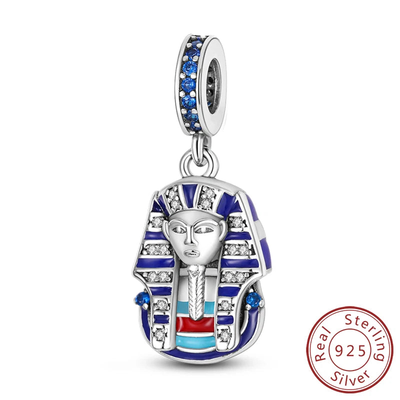 Sterling silver charm beads set featuring cross, angel, and evil eye designs for DIY jewelry making