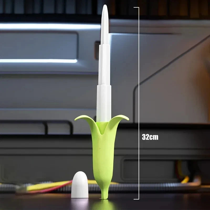 A white 3D gravity banana katana stress relief toy is shown vertically against a dark background.