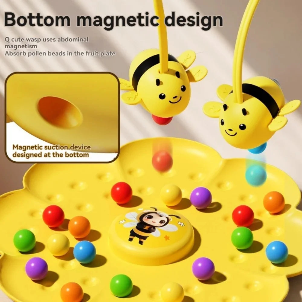 A yellow magnetic design board game featuring a bumblebee and various colored magnetic balls for kids