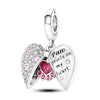A silver heart charm bead featuring pink zircon stones and engraved text on a pendant.