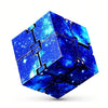 A blue cube puzzle with a starry sky design used as a stress relief toy