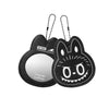 A black felt-like charm shaped like a smiling monster face with the text POP MART on it.