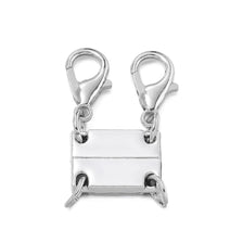 Silver magnetic layering clasps for necklaces and bracelets with a rectangular pendant.