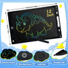 A black LCD writing tablet with a colorful screen showing a dinosaur drawing and various key features.