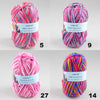 A collection of pink and multicolored milk cotton yarn skeins shown in various colors and textures.