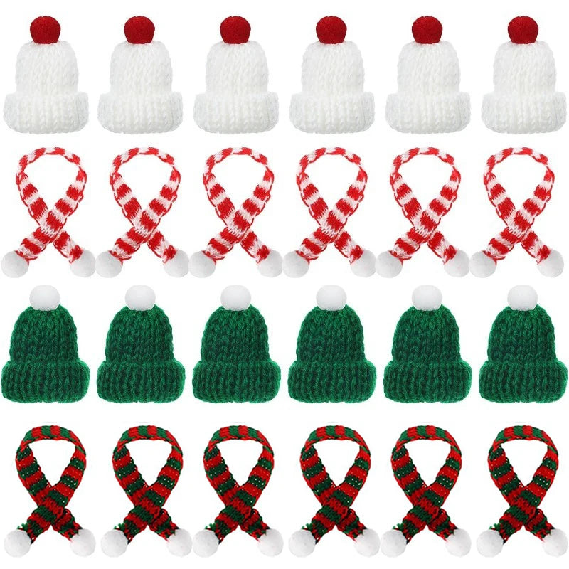 A set of mini knitted hats and scarves for dolls, featuring red and white patterns.