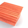 A rectangular board of natural African red rosewood wood planks viewed from an angle.