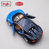 Blue diecast model of a sports car, inspired by the Porsche 911 GT2 RS, shown against a light gray background.
