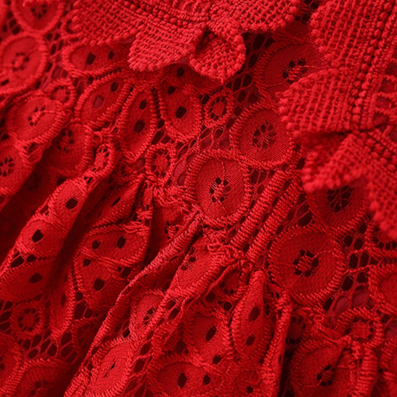 Close-up of a red lace princess dress for a toddler girl featuring a doll collar