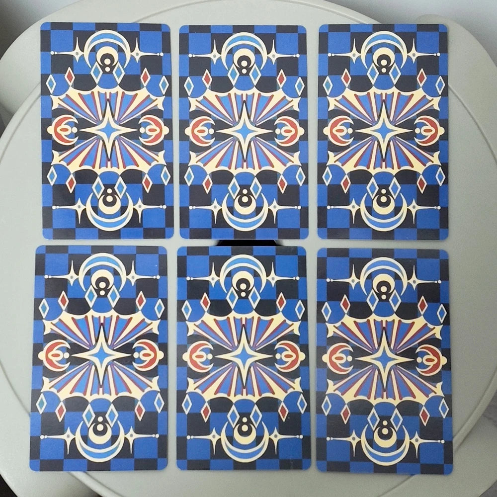 A set of twelve Rider-Waite Tarot cards featuring a blue and gold geometric design.