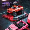 A red 1:64 scale remote control off-road monster truck is featured against a dark background with glowing lights.