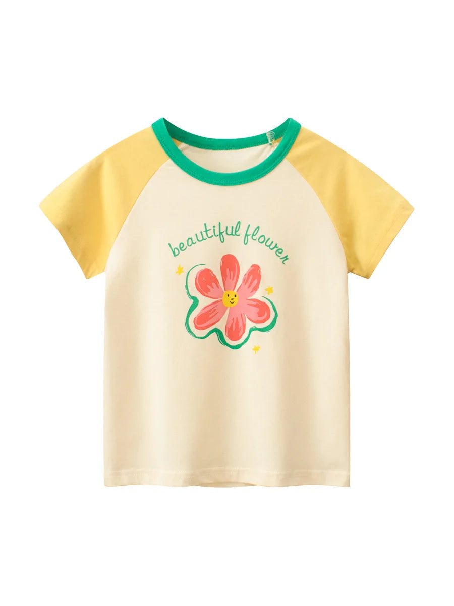 A light yellow short-sleeve cotton t-shirt with a green collar and a pink flower graphic on the chest.